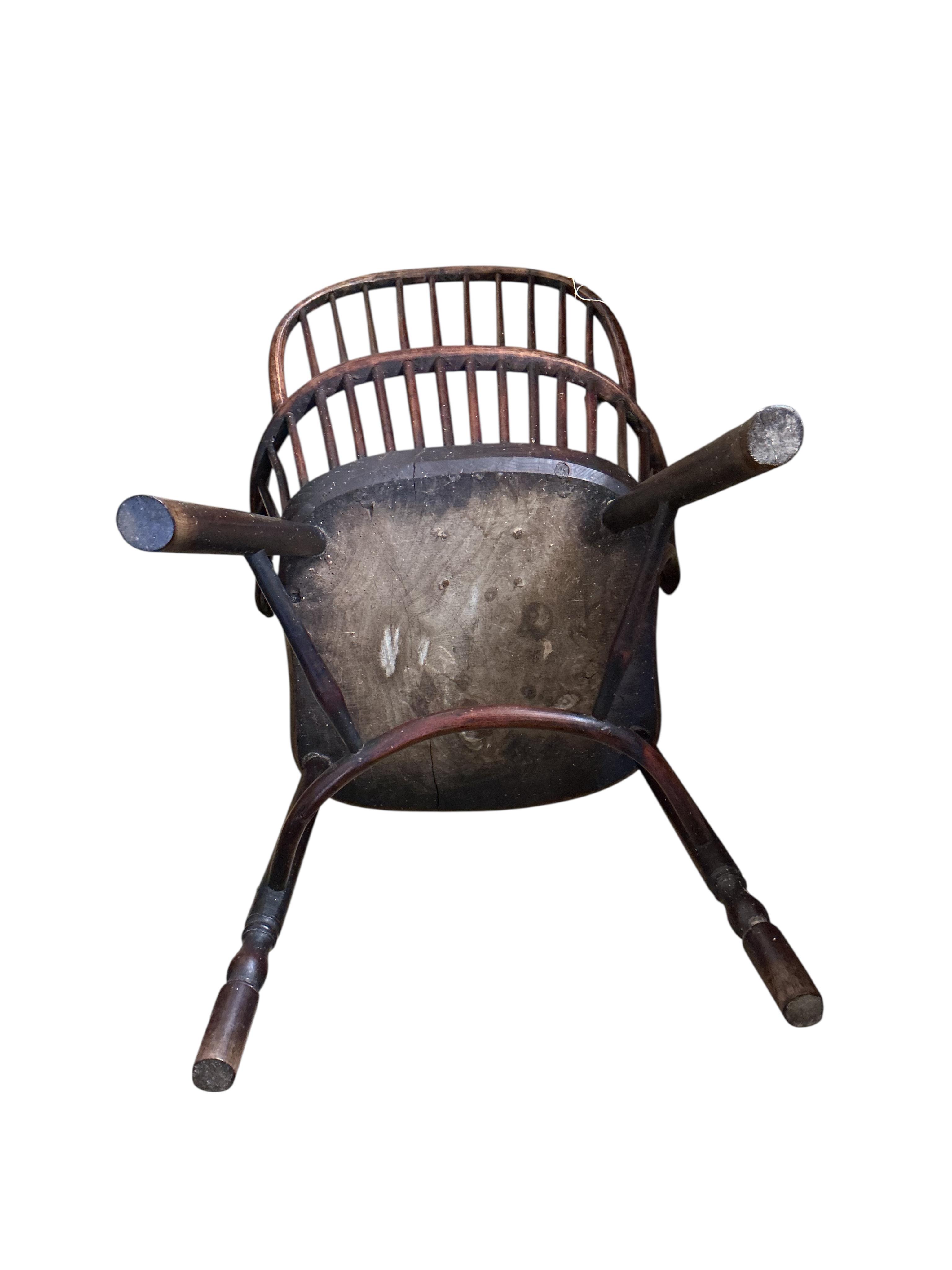 A 19th century ash, elm and beech Windsor comb back with crinoline stretcher armchair, width 57cm, depth 43cm, height 102cm